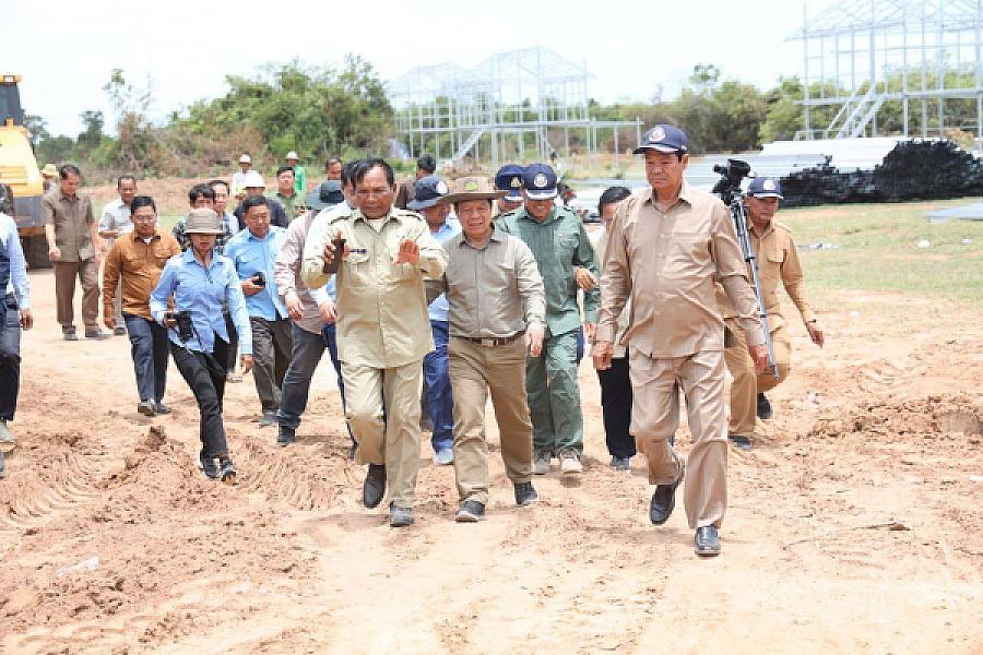 His Excellency Dr. Kun Kim inspects infrastructure construction and houses for veterans in Battambang Province