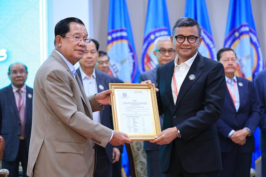 His Excellency Dr. Hang Chuon Naron donated funds to support the construction of three houses for veterans and retirees.